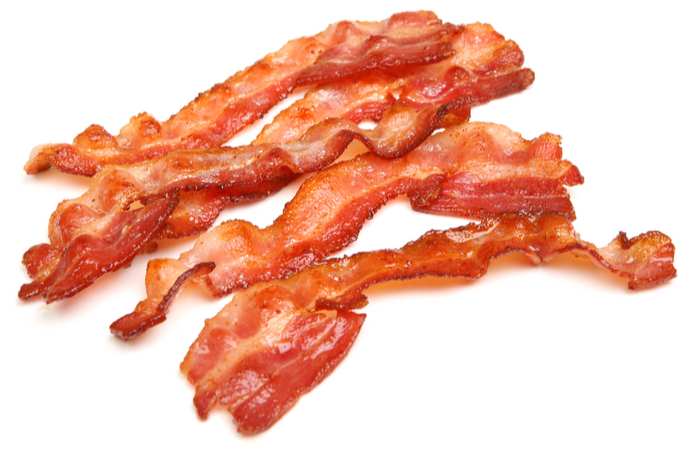 Bacon rashers on white isolated background